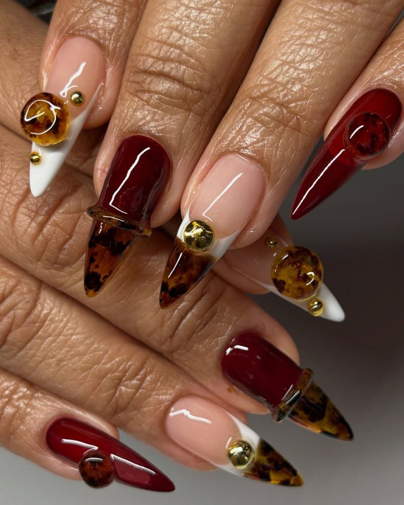 ongles gel-x stilettos longs avec nail art 3D