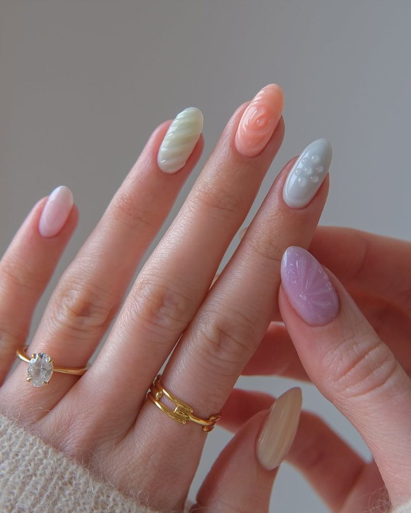 ongles barbe à papa pastels doux avec nail art 3D