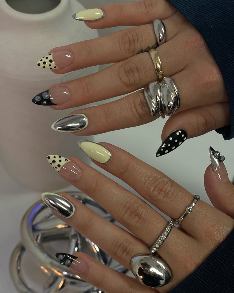 ongles jaune beurre, noir et argent avec art à pois
