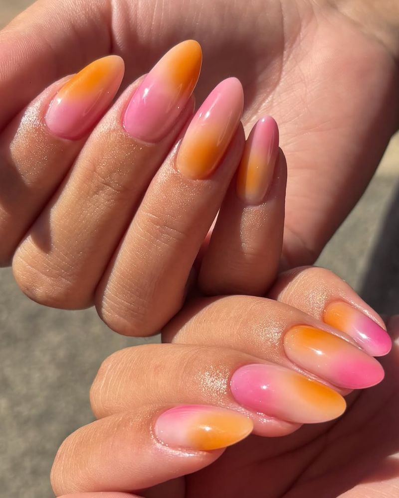 ongles rose et orange dégradés coucher de soleil sur ongles longs amande