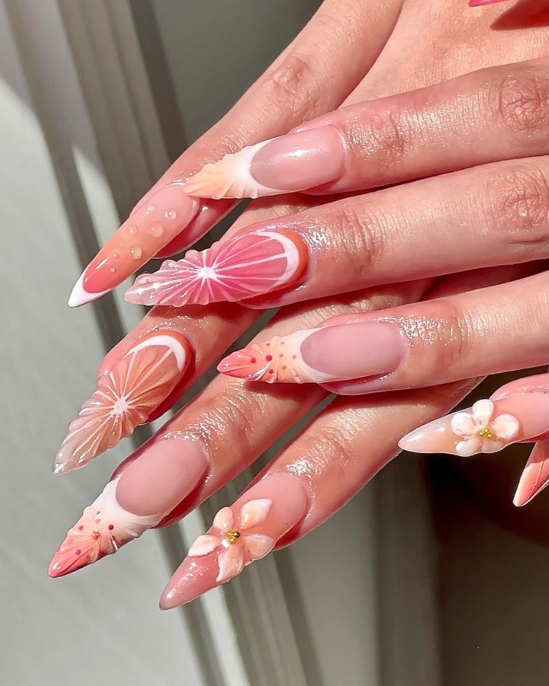 long stiletto nails, orange nail art, flower nail art, 3d nail art