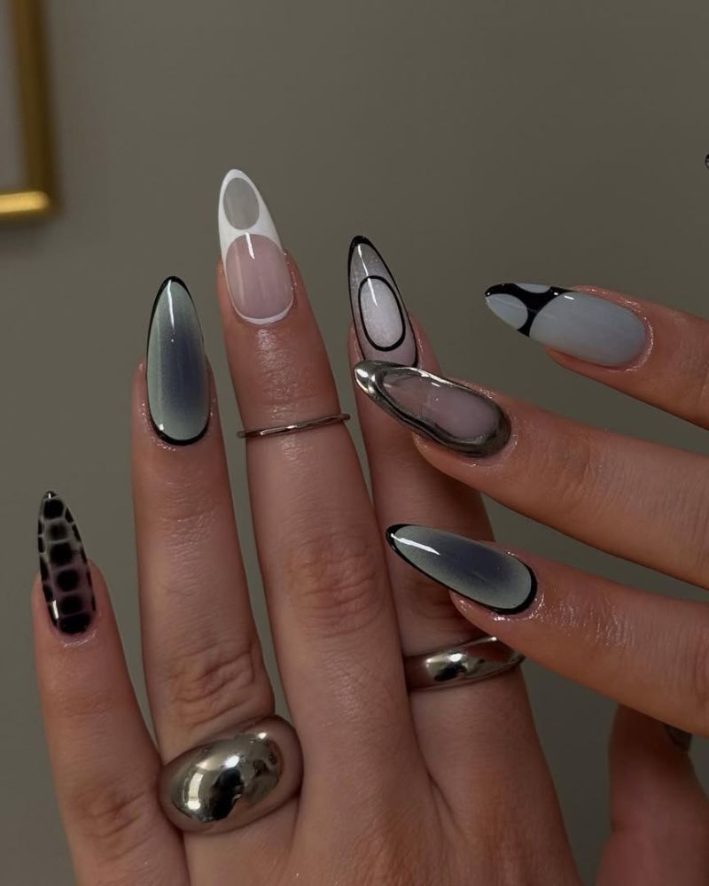 ongles stiletto avec nail art gris, noir et blanc