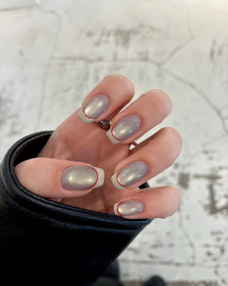 designs ongles hiver base gris cat eye