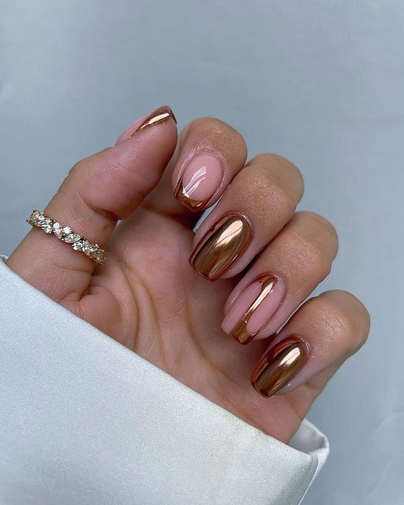 ongles chrome bronze d’automne sur manucure élégante