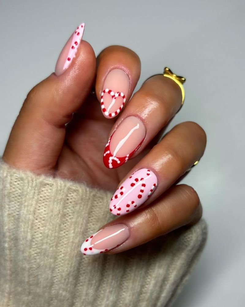 ongles rouges et roses cane de bonbon