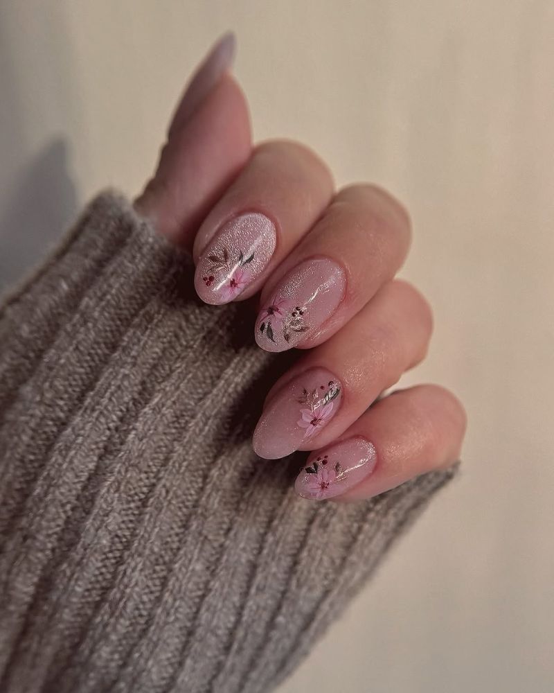 ongles effet œil de chat, vernis rose clair pailleté