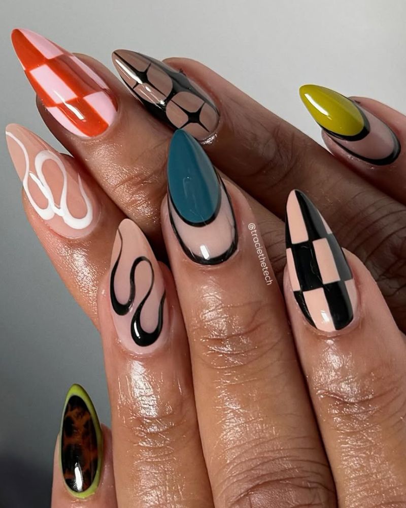 nail art stiletto automnal avec multiples couleurs