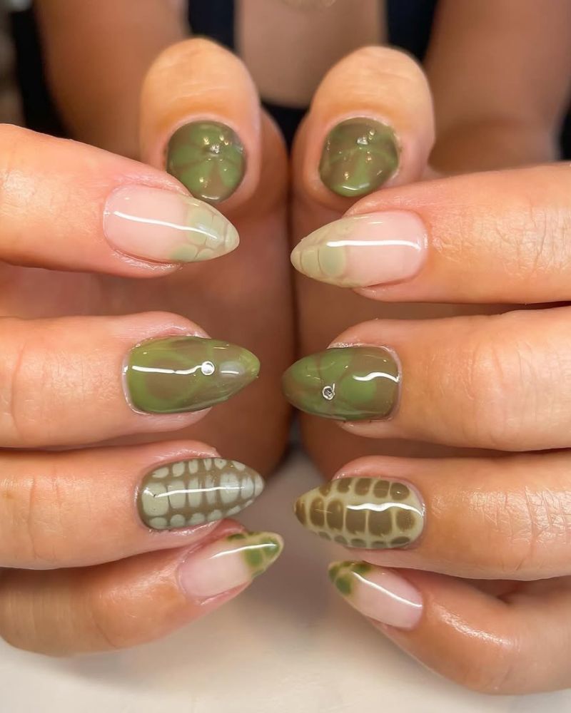 ongles vert olive avec nail art vert clair