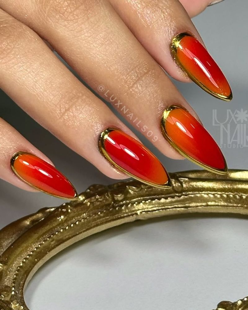 aura orange et rouge soulignée d’or chromé