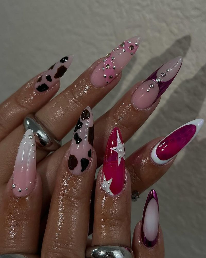 ongles stiletto longs rose avec motif vache