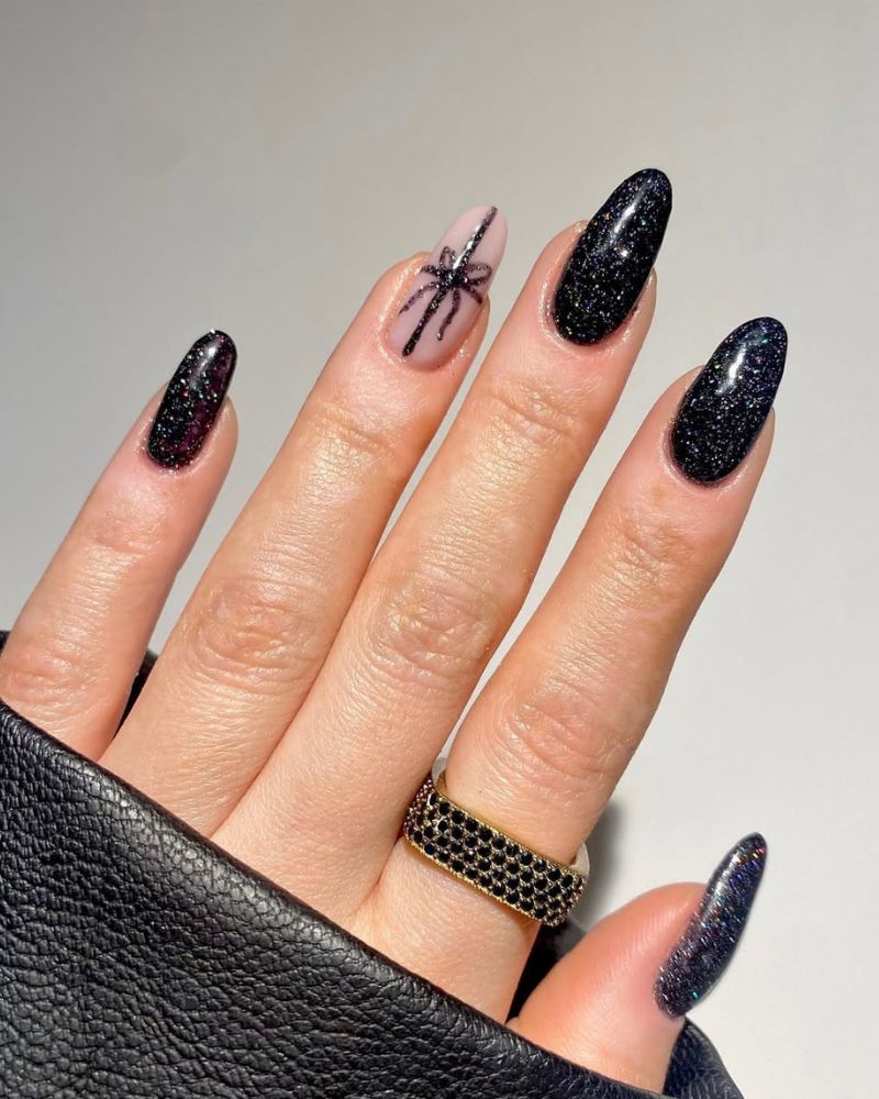 designs d’ongles noirs pour Noël avec nœud