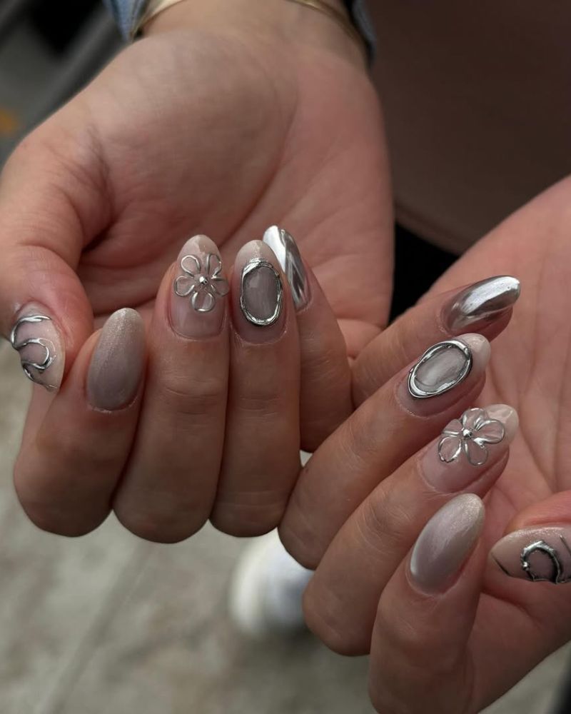designs d'ongles argentés simples avec éléments 3D, sur ongles amande