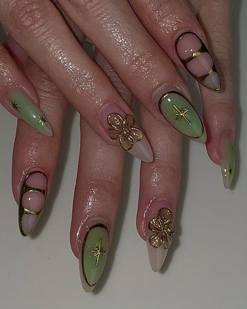 ongles verts stilettos simples avec nail art doré