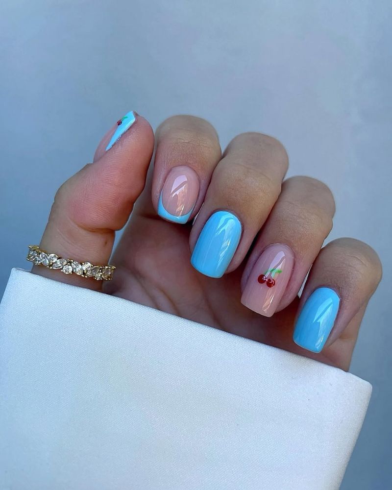 ongles bleus, ongles printaniers, nail art cerise