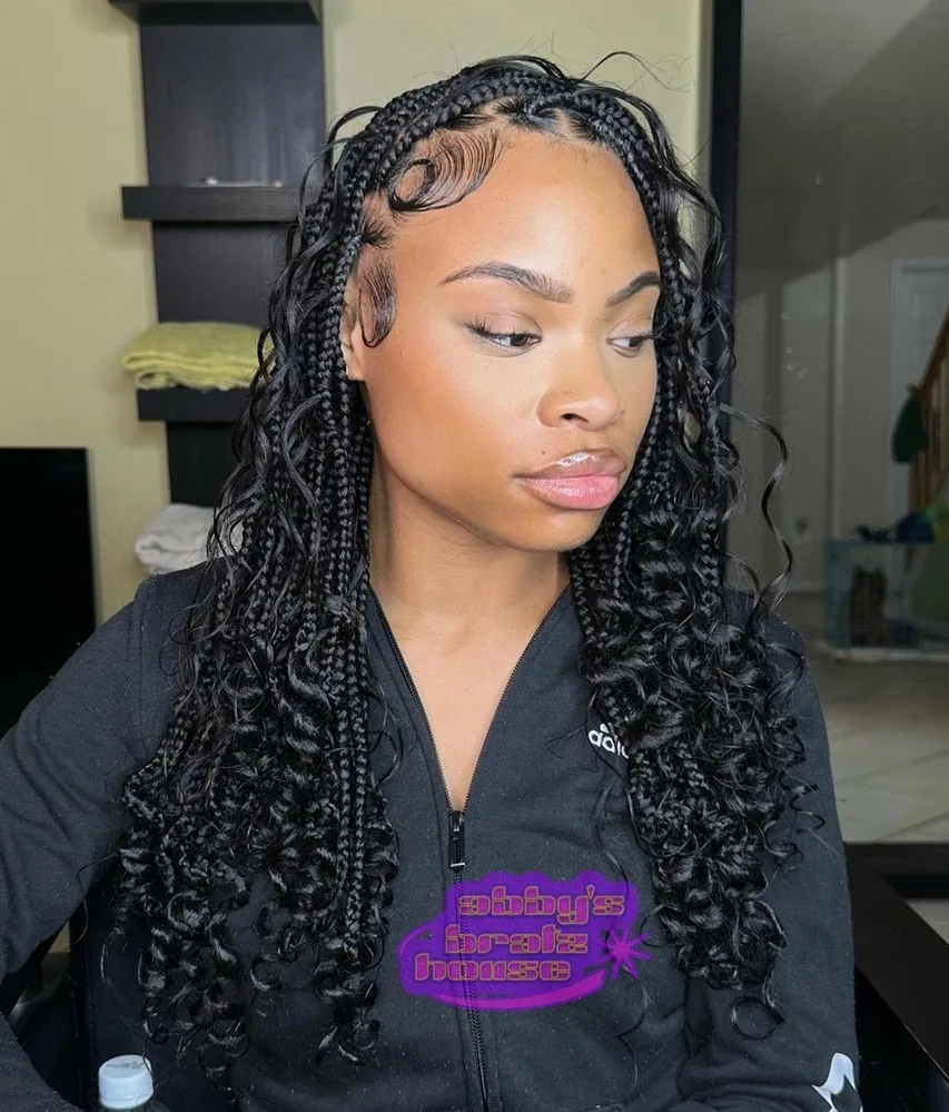 Boho knotless braids avec des pointes bouclées laissées libres