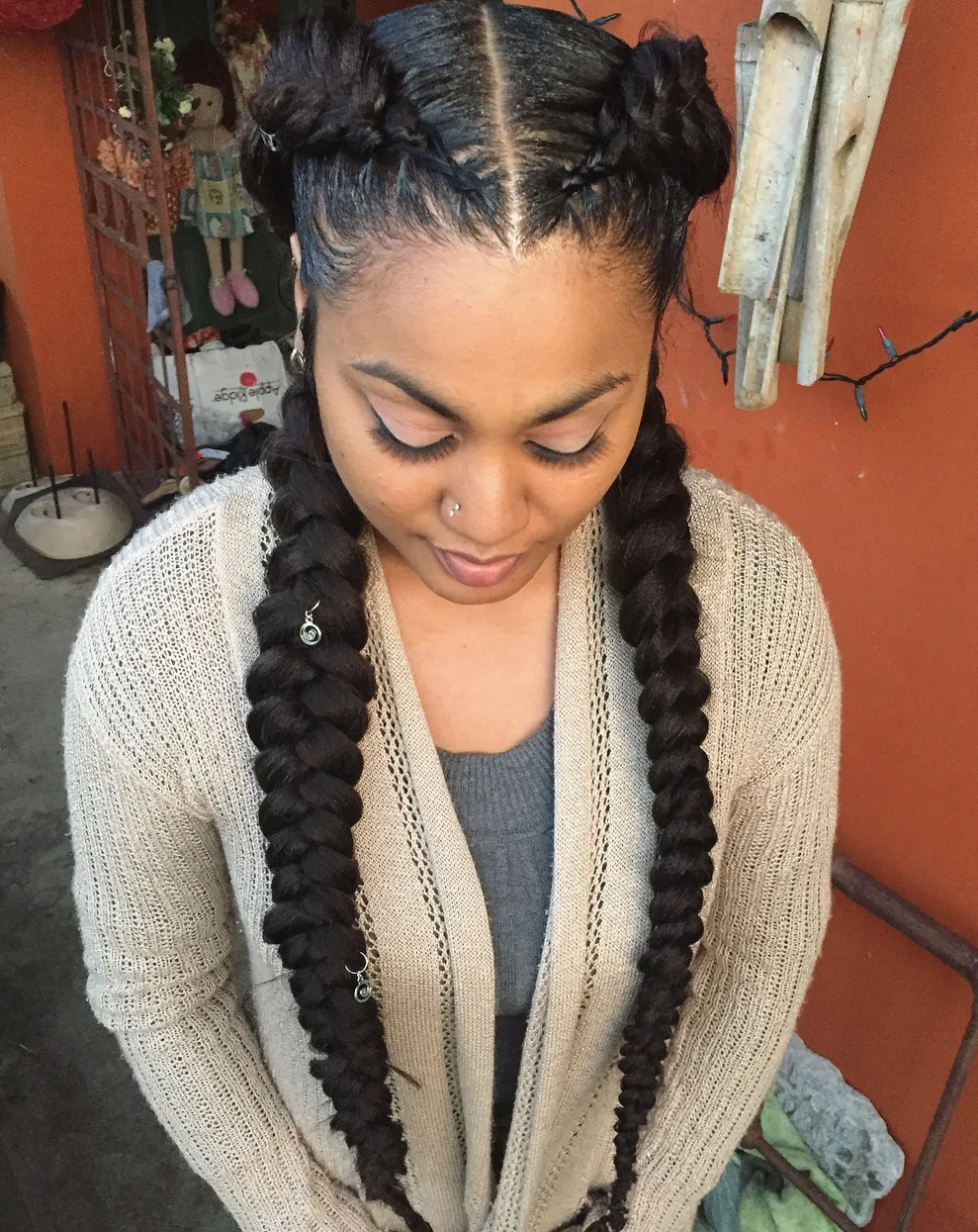 Boxer braids, deux tresses collées serrées
