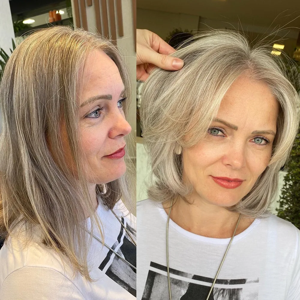 Carré volumineux avec frange rideau encadrant le visage