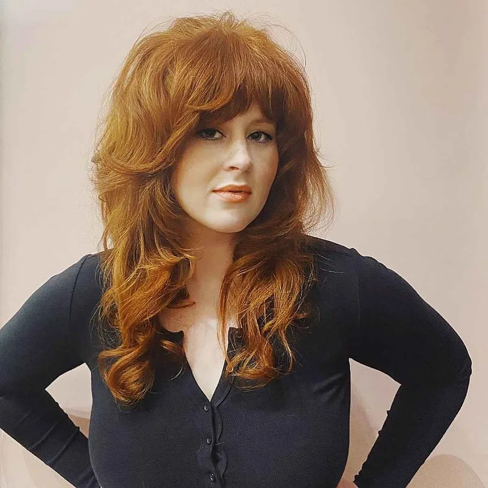 Cheveux épais longs choppy volumineux avec frange