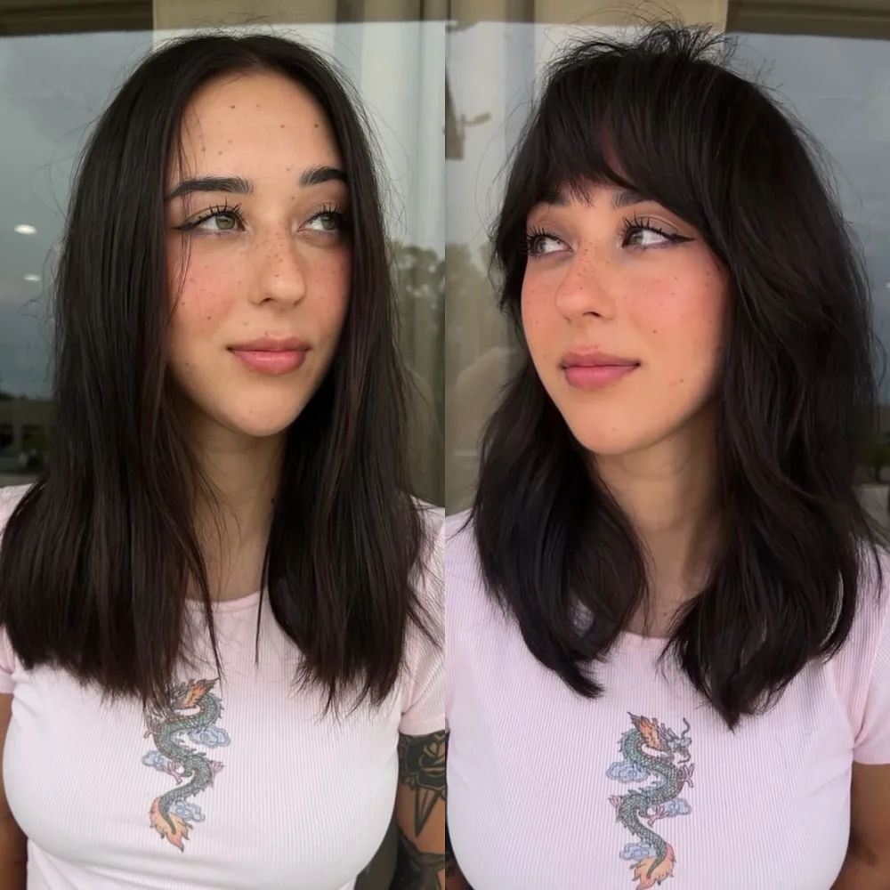Coupe mi-longue brune avec bottleneck bangs légèrement arquées