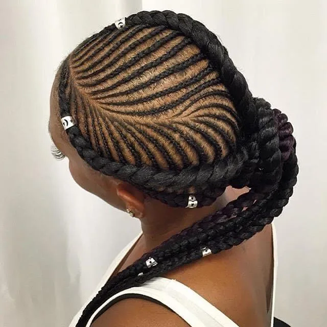 Couronne de cornrows se prolongeant en faux locs