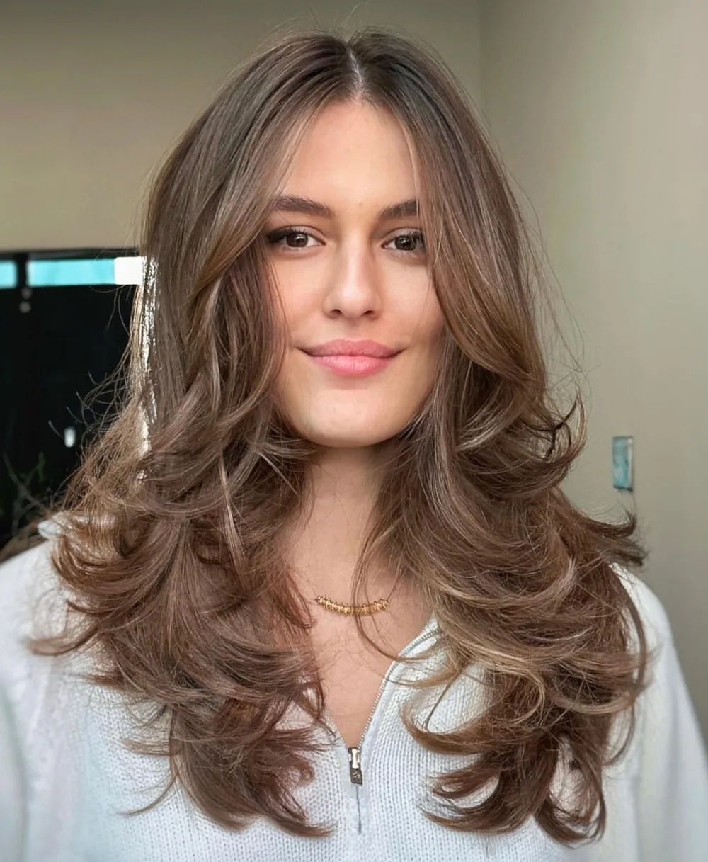 Dégradé long façon années 90 avec brushing bombshell volumineux
