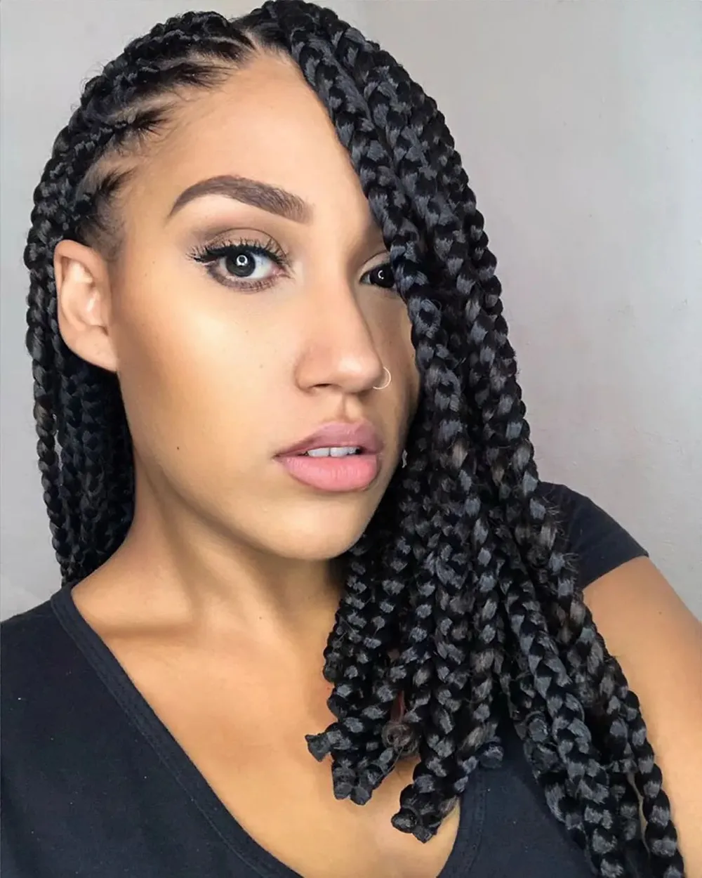 Lob tressé asymétrique en box braids