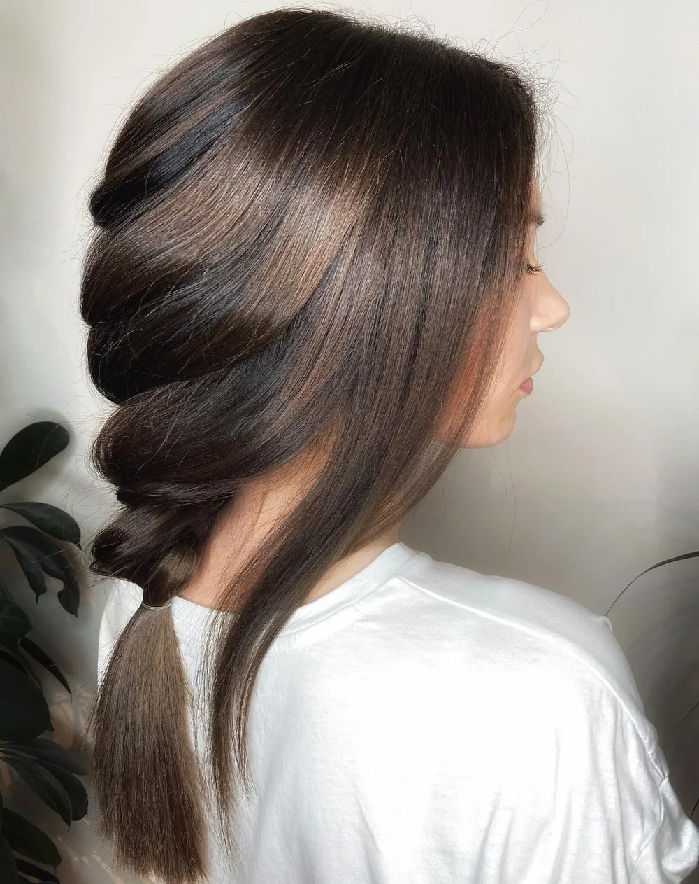 Tresse basse floue et lisse sur balayage