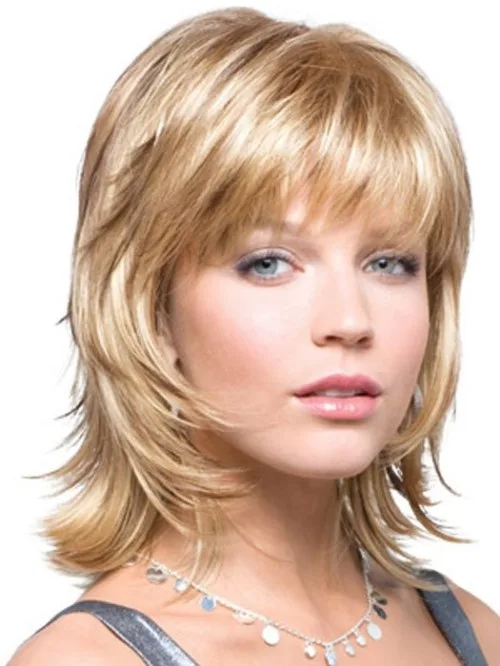 Coupe mullet shag blond avec frange et couches effilées, look texturé automne