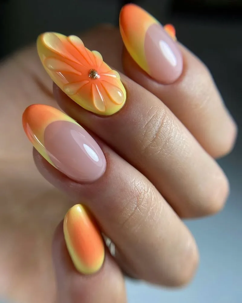 Ongles amande aura orange et jaune avec fleur 3D blanche, nail art d'été