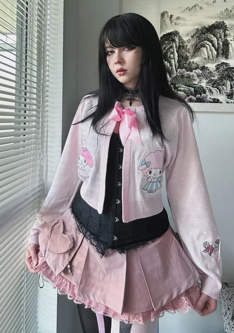 Déguisement vampire kawaii rose et noir avec corset et jupe plissée